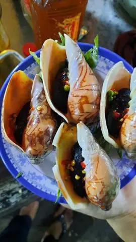 Hình ảnh Ốc Giác Nướng mắm tiêu 