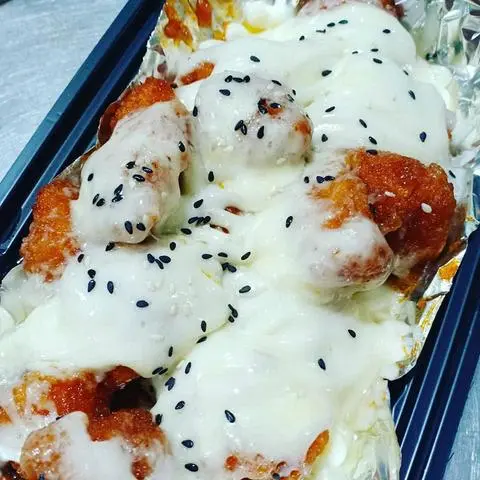 Hình ảnh gà cay đút lò phomai