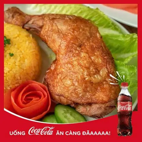Hình ảnh cơm đùi gà góc tư + coca 390ml
