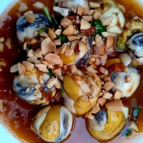 Hình ảnh Cút lộn xào me