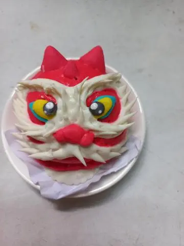 Hình ảnh Bánh bao hình  Đầu lân màu đỏ  1 cái