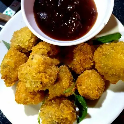 Hình ảnh Cút lộn chiên giòn chấm me