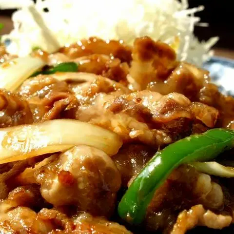Hình ảnh St-11: Cơm thịt heo xào gừng (Ginger flavored slices of grilled pork)