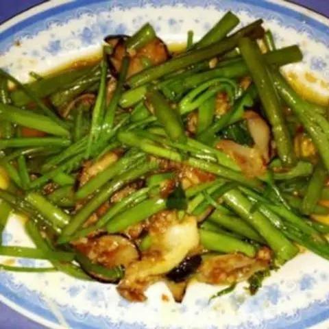 Hình ảnh Ốc muỗng xào rau muống