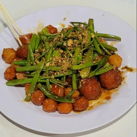 Hình ảnh Cá Viên Sốt Me Tỏi