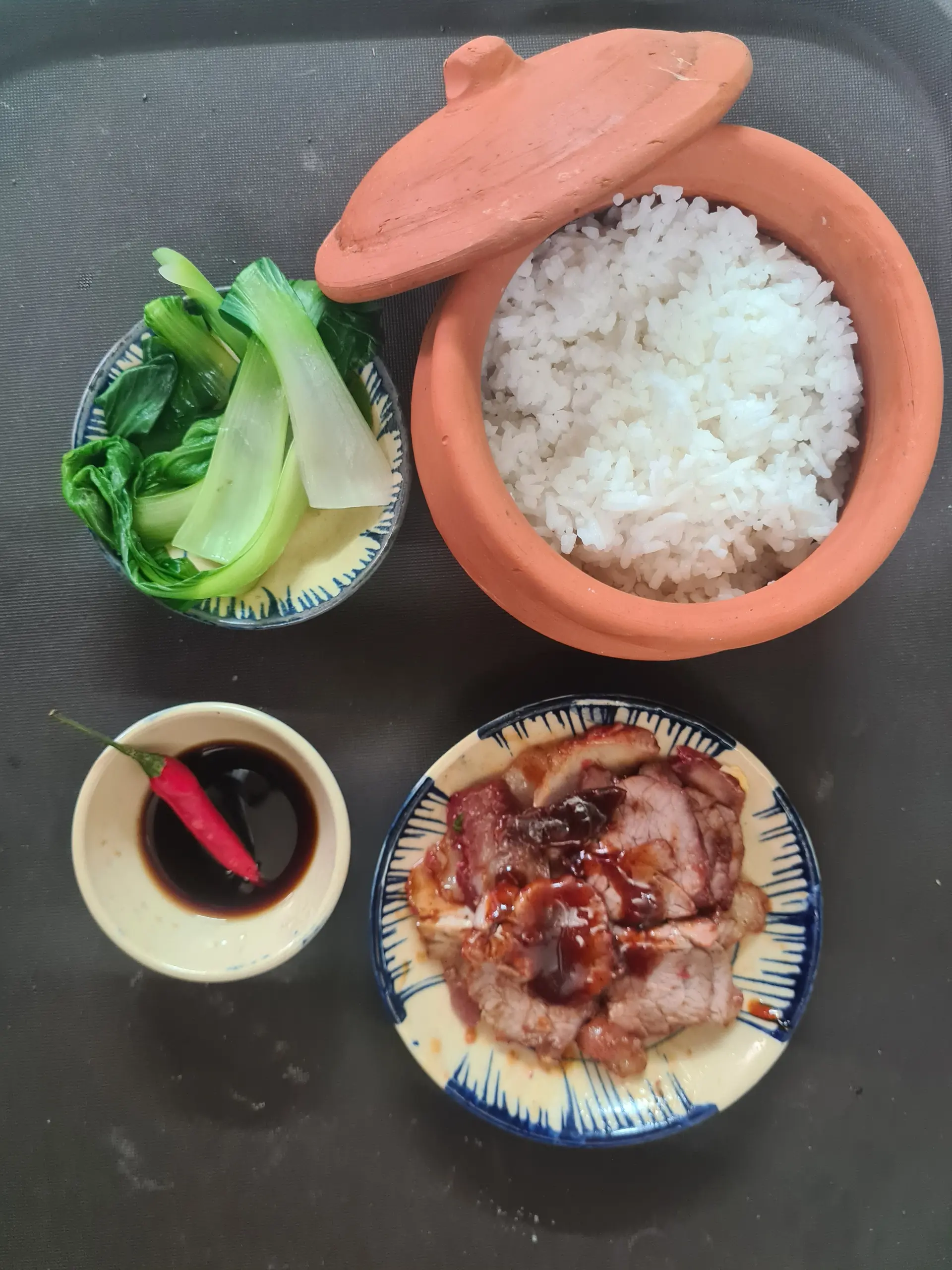 Hình ảnh Cơm Thố Xá Xíu