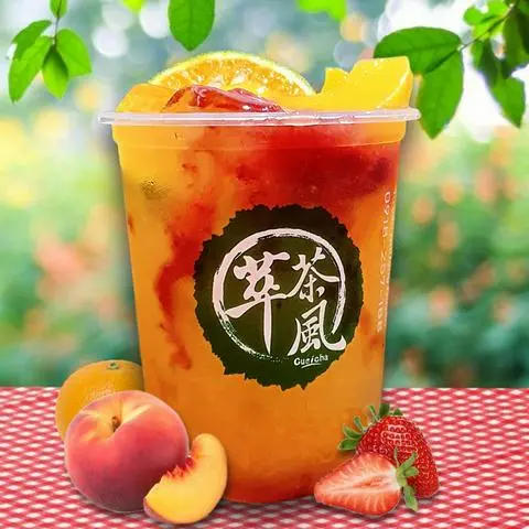 Hình ảnh New!! Trà Cam đào dâu tây (tặng Đào miếng)