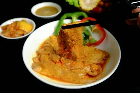 Hình ảnh Vú heo ướp sate chưa nướng