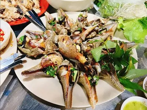 Hình ảnh Ốc búa nướng mỡ hành 