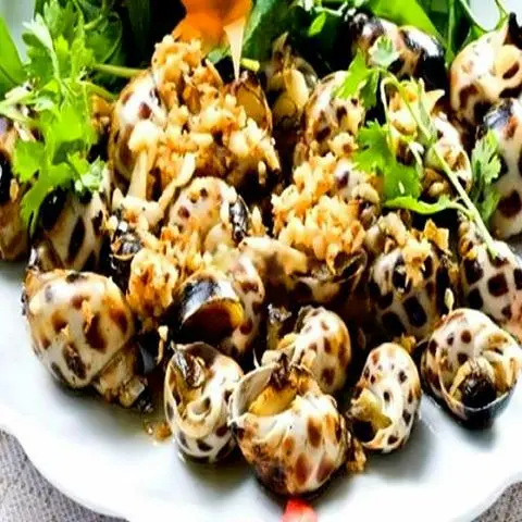 Hình ảnh Ốc hương xào bơ