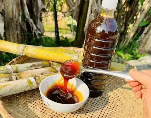 Hình ảnh Mật mía nguyên chất (chai 1 lít)