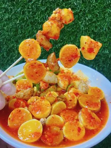 Hình ảnh Trứng gà non sốt Thái cay 5 cấp độ