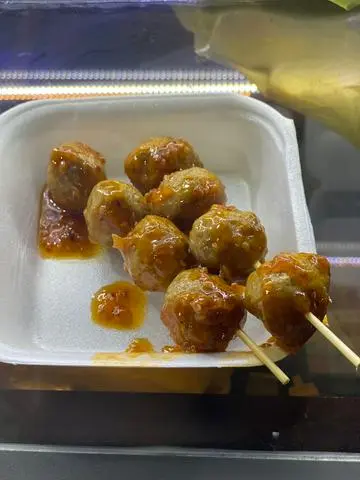 Hình ảnh Bò viên bi nướng sốt tomyum