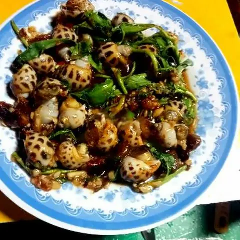 Hình ảnh Ốc hương xào me