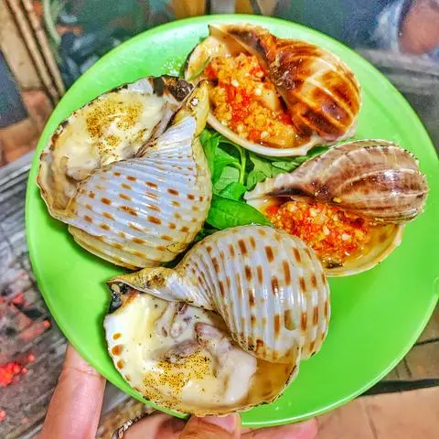 Hình ảnh Ốc heo xào
