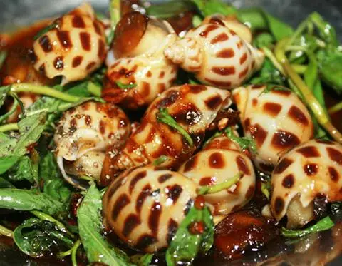 Hình ảnh Ốc Hương Xào Me