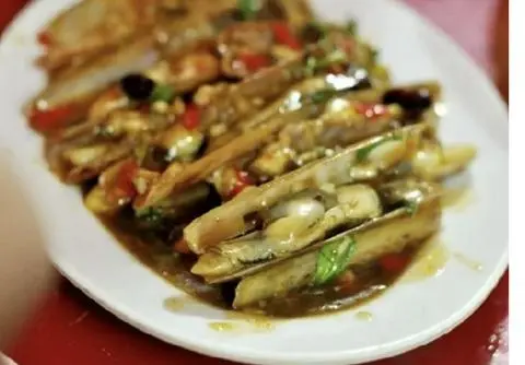Hình ảnh Ốc móng tay xào me 