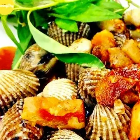 Hình ảnh Sò huyết xào bơ cay