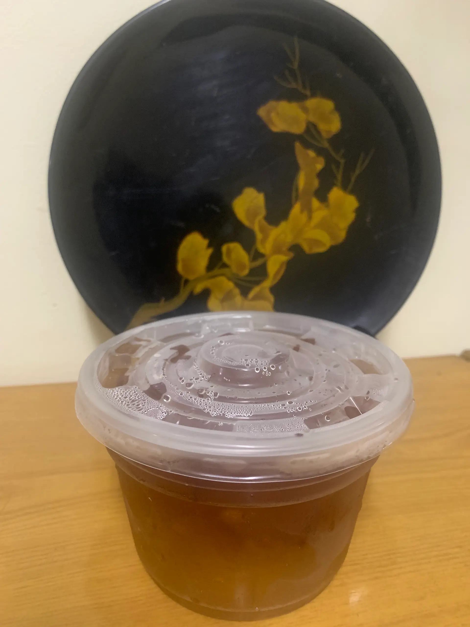 Hình ảnh 1 hũ topping thạch lục trà