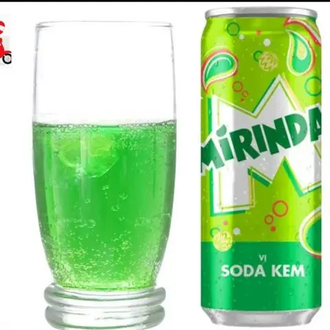 Hình ảnh 1 lon mirinda vị soda kem + 1 ly đá