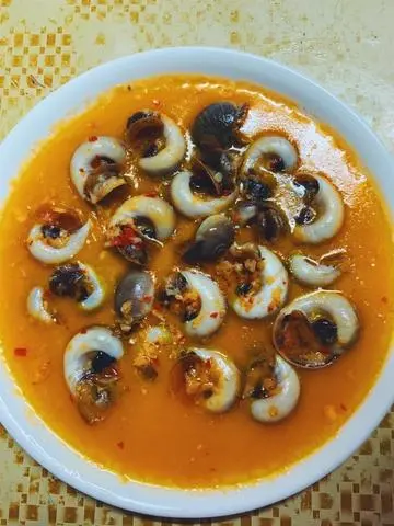 Hình ảnh ốc mỡ xào bơ cay 