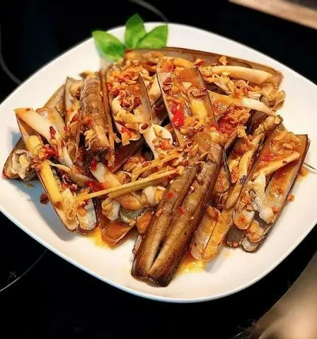 Hình ảnh Ốc Móng Tay Xào Bơ Cay