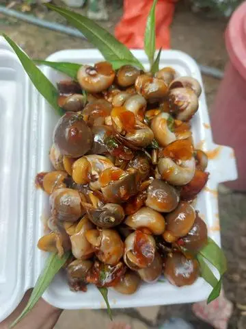 Hình ảnh ốc mỡ rang me