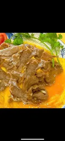 Hình ảnh Cơm bò phủ trứng