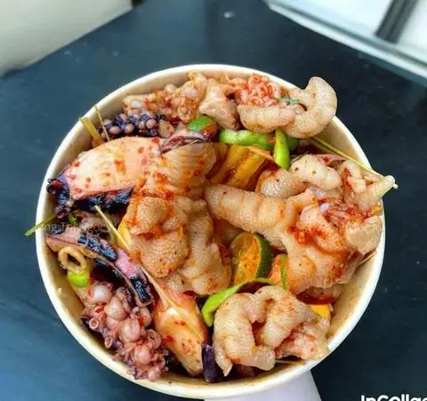 Hình ảnh Chân Gà Rút Xương Mix Râu Tuộc ( SỐT THÁI)