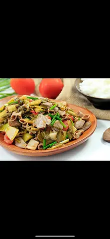 Hình ảnh cơm lòng heo xào cải chua