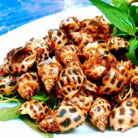 Hình ảnh Ốc Hương Xào Rau Muống