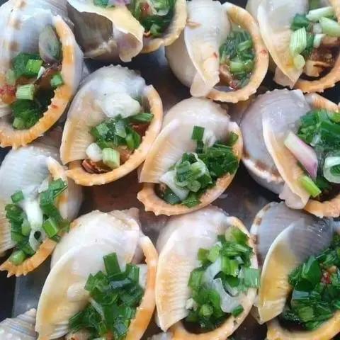 Hình ảnh Ốc tỏi nướng mỡ hành một con