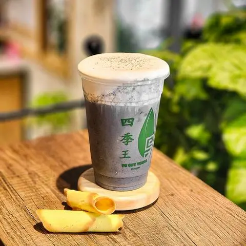 Hình ảnh Trà Sữa Than Tre Kem Trứng Tứ Quý Vương