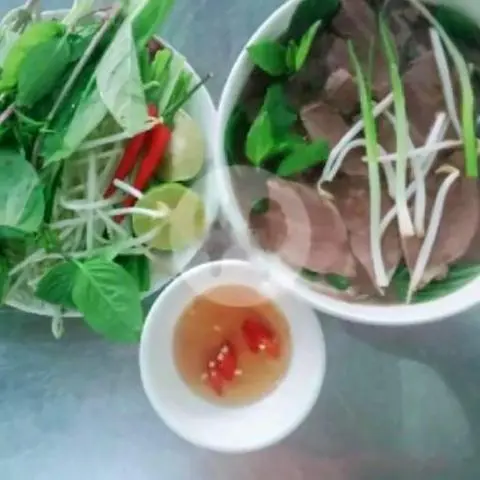 Hình ảnh Cháo má heo thái lát