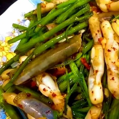 Hình ảnh Ốc Mống Tay Xào Rau Muống