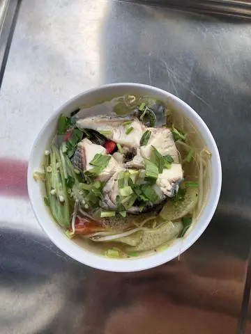 Hình ảnh Cơm canh chua cá lóc + rau xào + canh + trái cây 