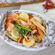 Hình ảnh Nấm nướng giấy bạc (tôm+mực+đậu hủ trứng)
