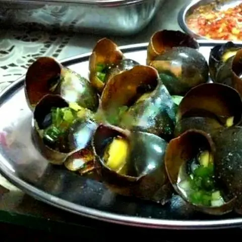 Hình ảnh Ốc Bươu Nướng Mỡ Hành