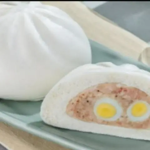 Hình ảnh Bánh bao thịt heo 2 trứng cút