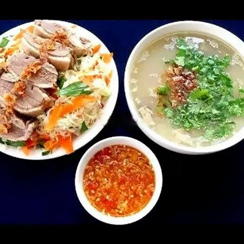 Hình ảnh Cháo huyết - gỏi vịt 1 người