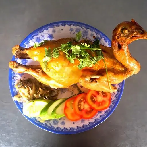 Hình ảnh Gà ta xối mỡ nguyên con