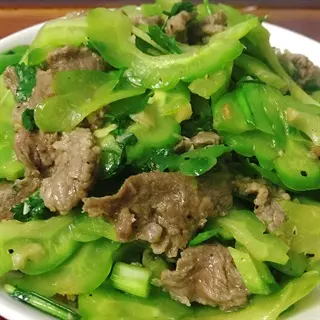 Hình ảnh Cơm khổ qua bò trứng - Coca chai