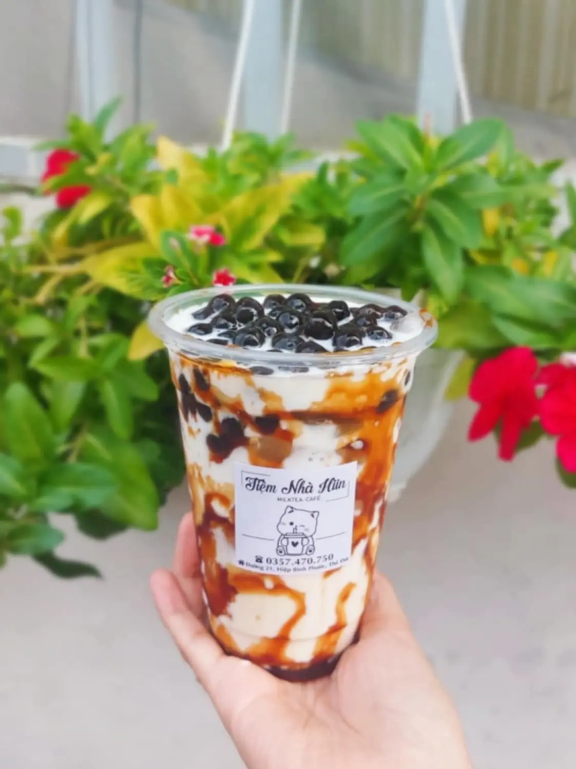 Hình ảnh Sữa tươi trân châu đường đen (đã gồm thuế)