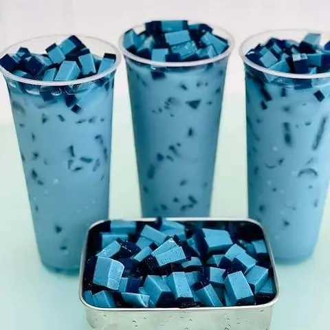 Hình ảnh trà sữa xanh nhài hoa đậu biếc