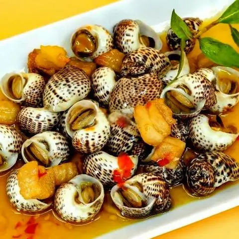Hình ảnh Ôc Mỡ Bông Xào Bơ Cay 