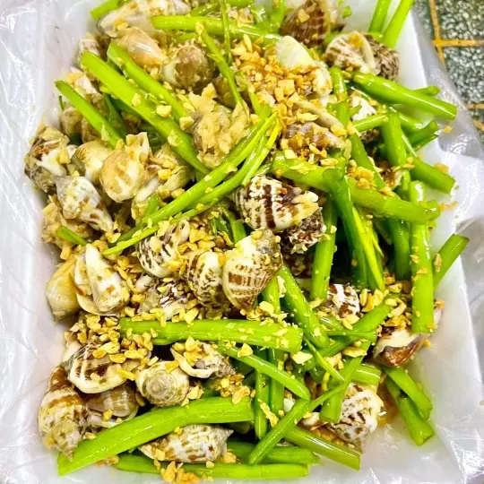 Hình ảnh Ốc Nhảy Xào Rau Muống