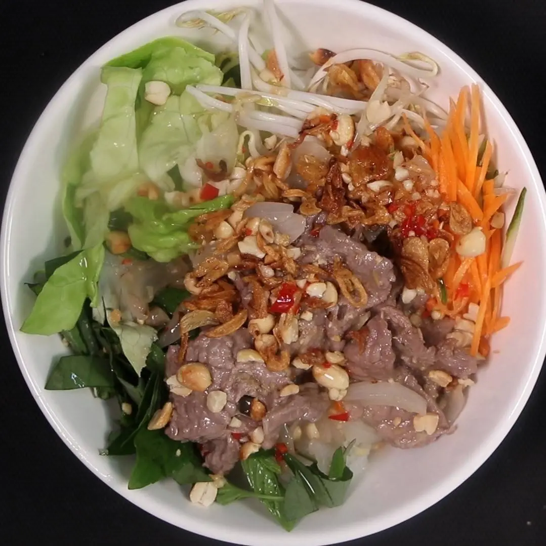 Hình ảnh Combo Mặn 4 (1 Bún Heo Xào củ hành + 1 Nước Ép)