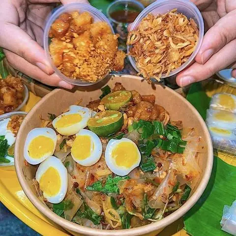 Hình ảnh Bánh Tráng Trộn Tóp Mỡ Cút Lòng Đào (9-10 Gmier)