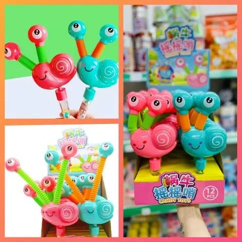 Hình ảnh Cây Kẹo Ốc Sên Ngọc Kéo Dài Lò Xo Co Giãn, Kẹo Đồ Chơi Có Đèn Lắc Lư Kêu Vui Tai 2in1