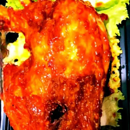 Hình ảnh Cơm gà góc tư sốt cay đặc biệt